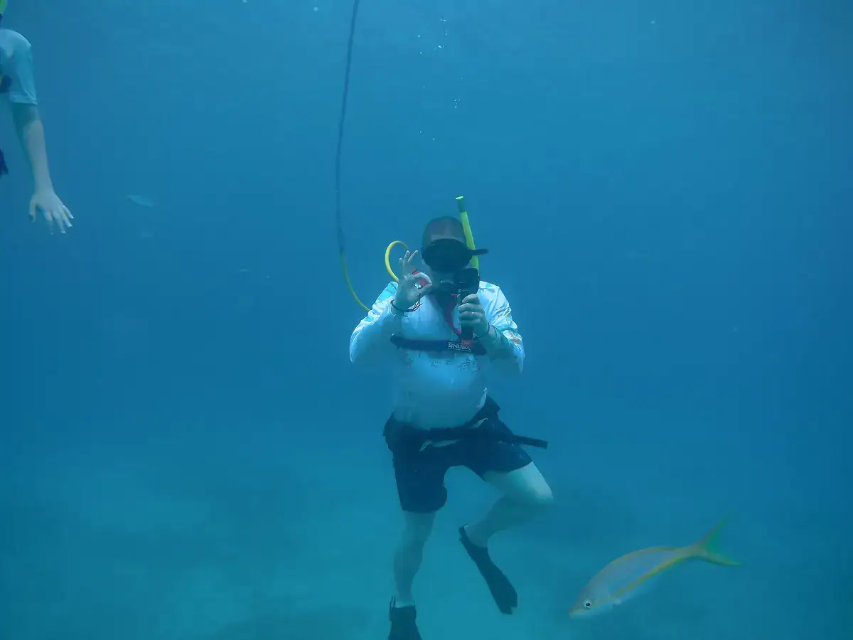 SNUBA participant giving the OK signal underwater in Sint Maarten