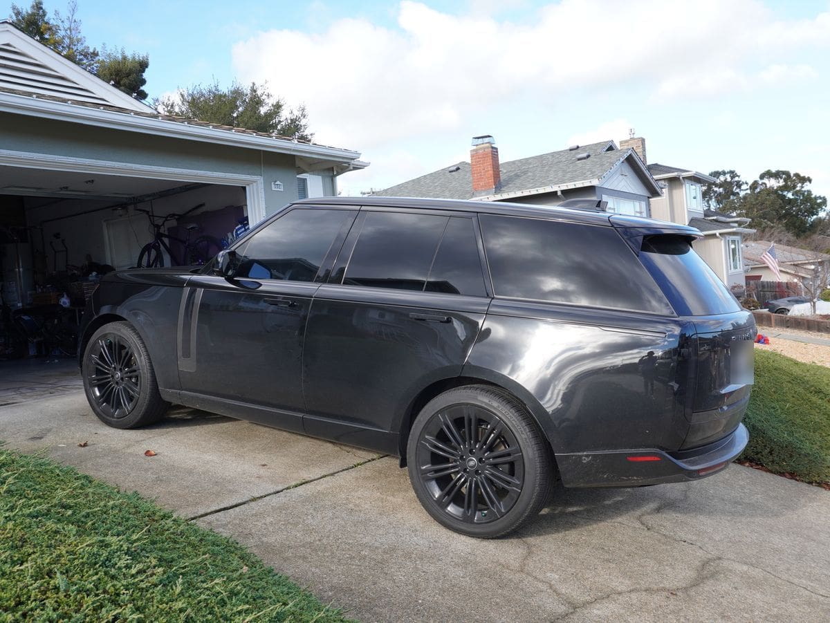 Home 6 Black Range Rover before the detail, its paint dull and dusty