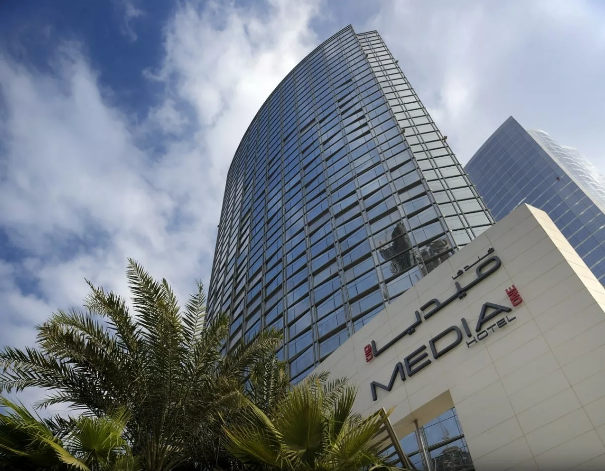 Media-One-Building Outside shot of Media One Hotel tower showcasing its height.
