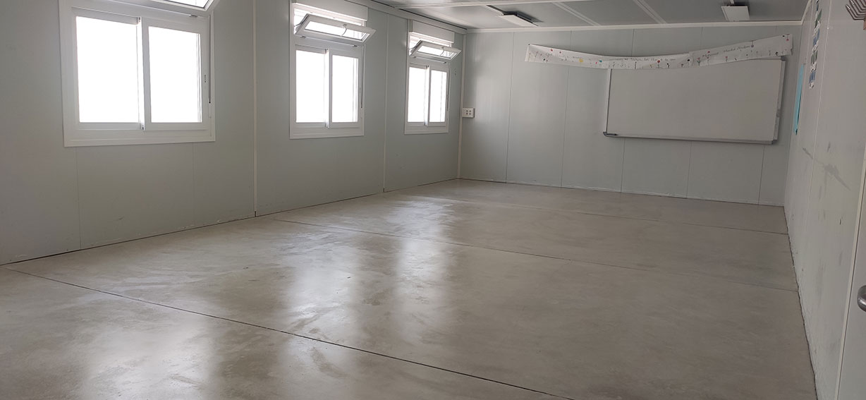 Recuperació de paviment de formigó en Institut