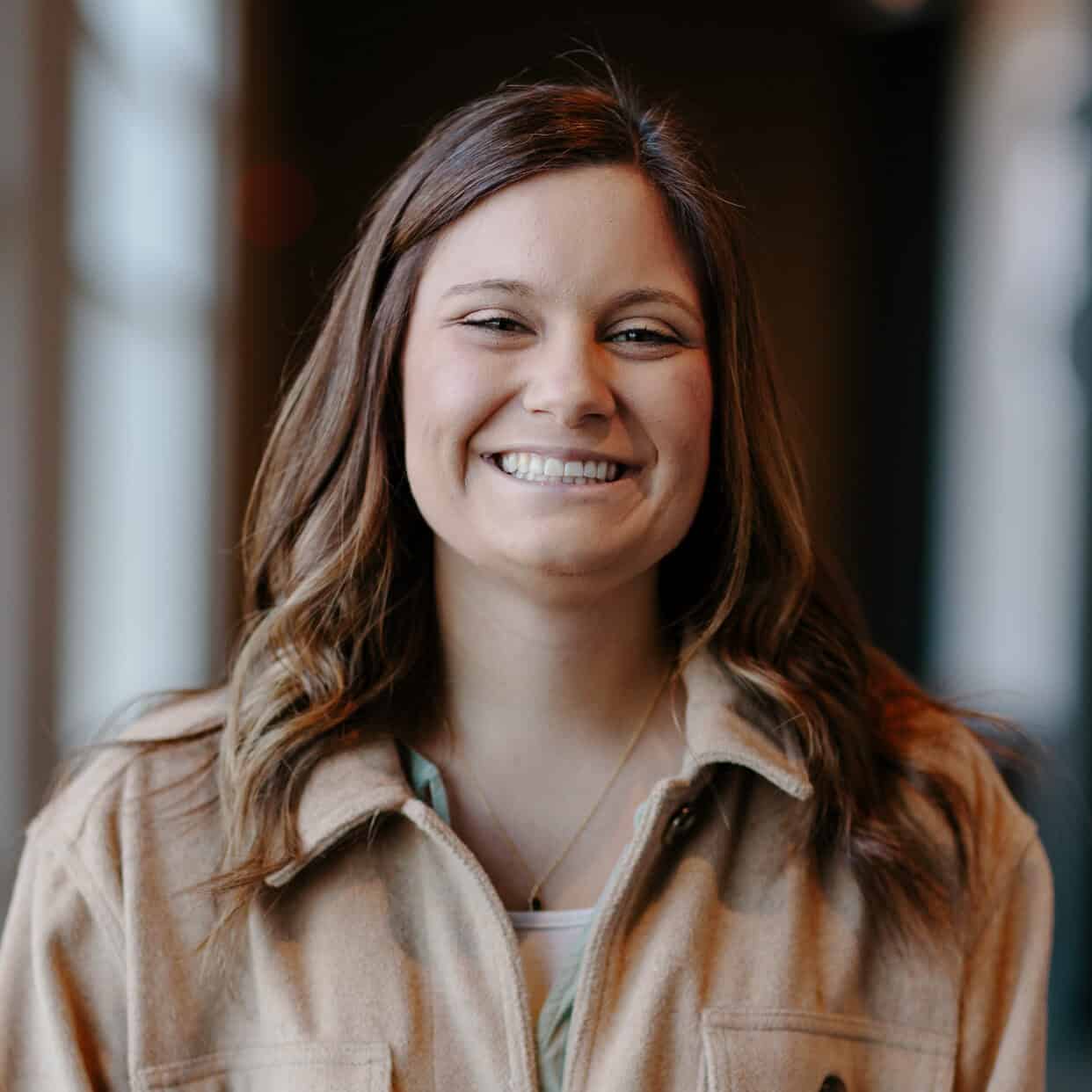 Beautiful smiling woman enjoying vacation at 407 and Beyond Vacation Co.