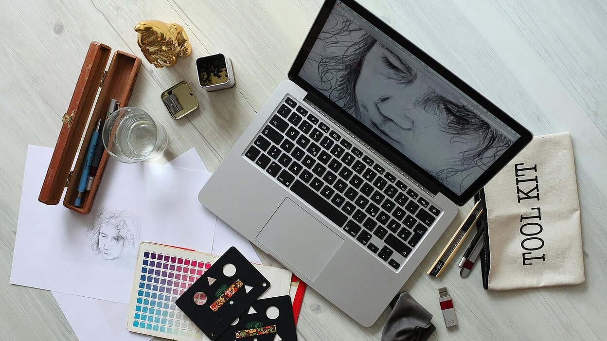 laptop and other accessories on table