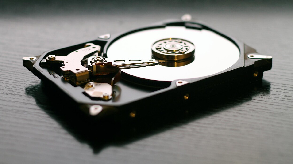 black internal hdd on black surface