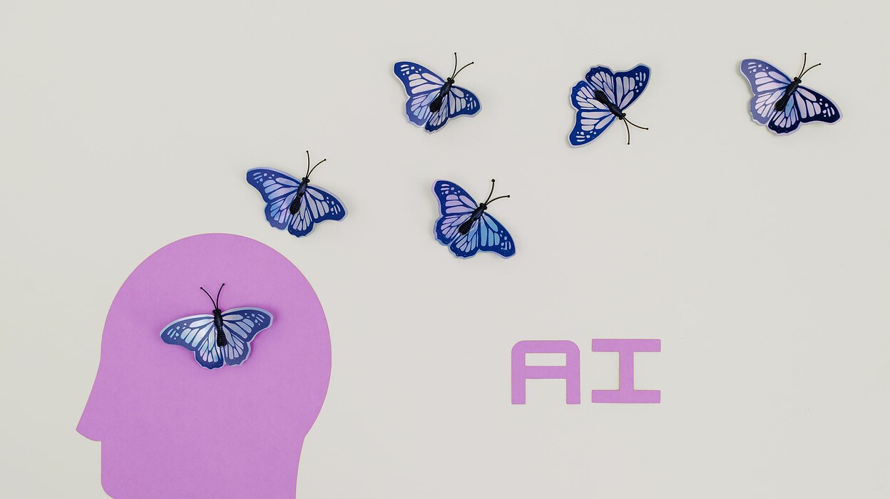 white and blue butterflies illustration