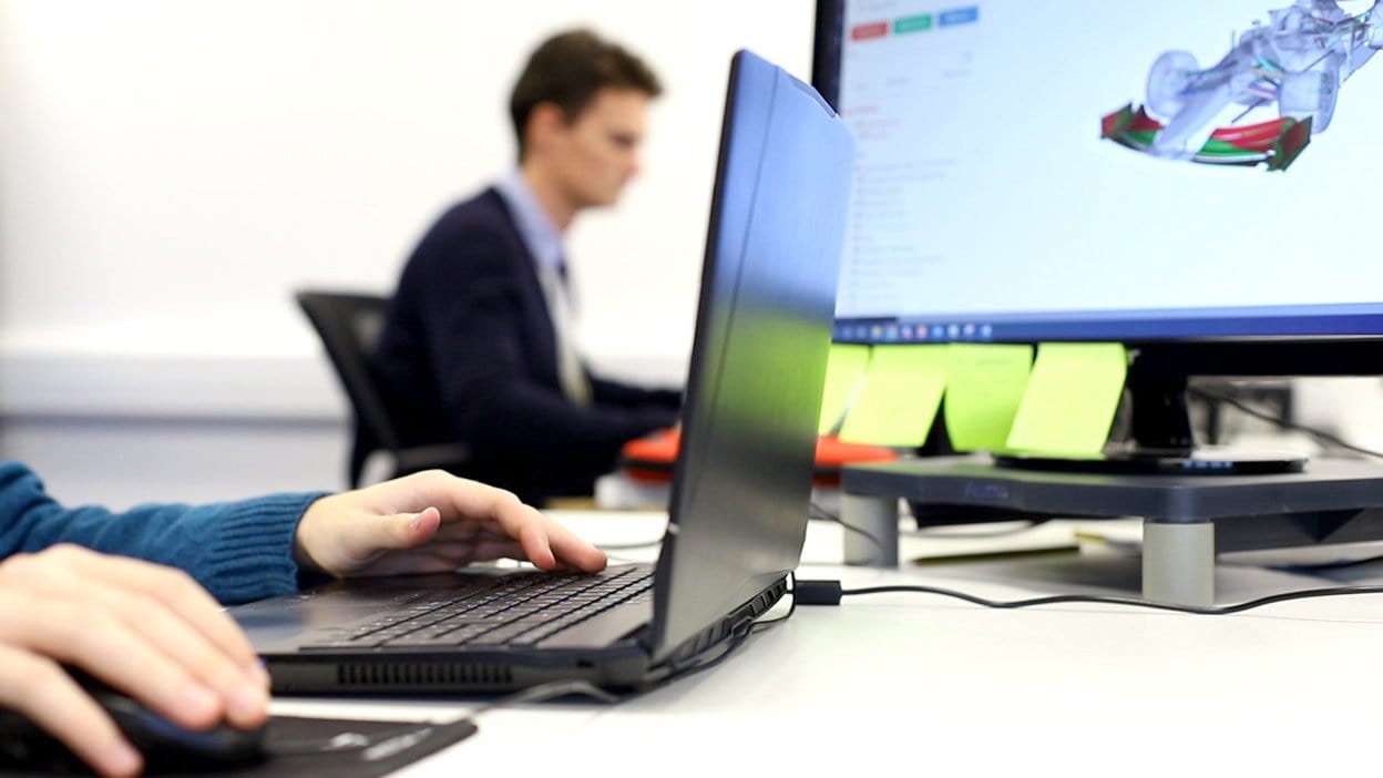 people working on computers with the bramble platform on their screens. Adopt Open Source CFD