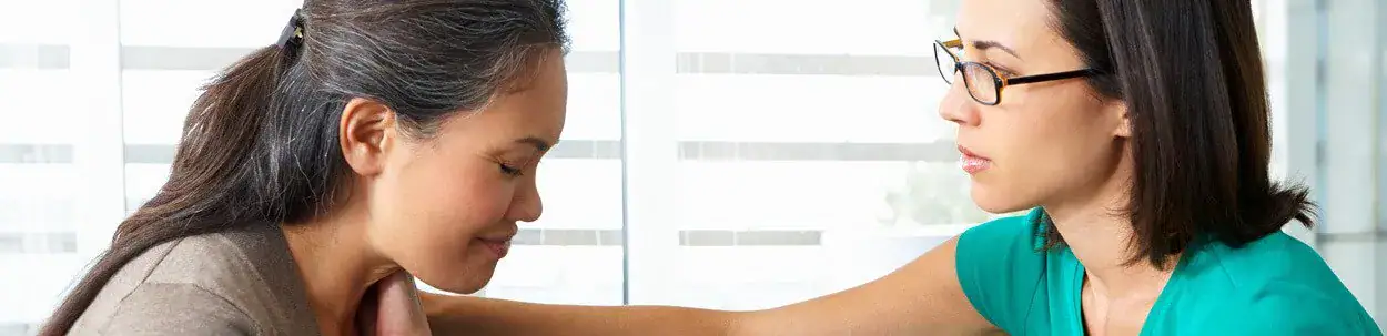 two women in consultation