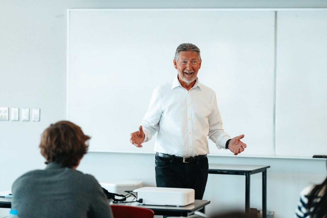 Captain Dan Buz holding a lecture at ABC Toronto 2023.