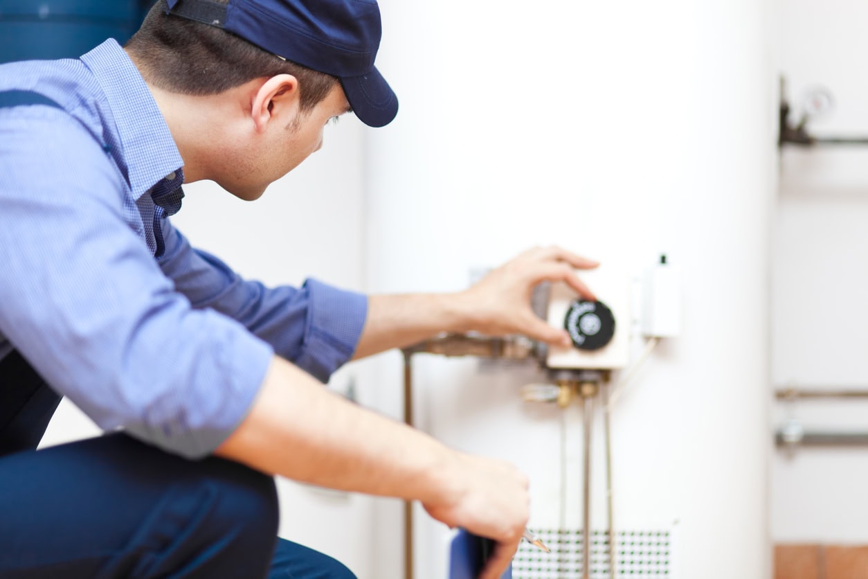 water-heater-repair-villa-park-il-water-heater-replacement Working on a water heater