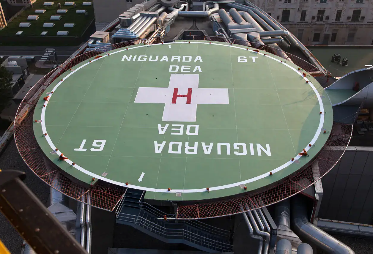 Rivestimento in resina a norma ENAC piattaforma elisoccorso Ospedale Niguarda Milano