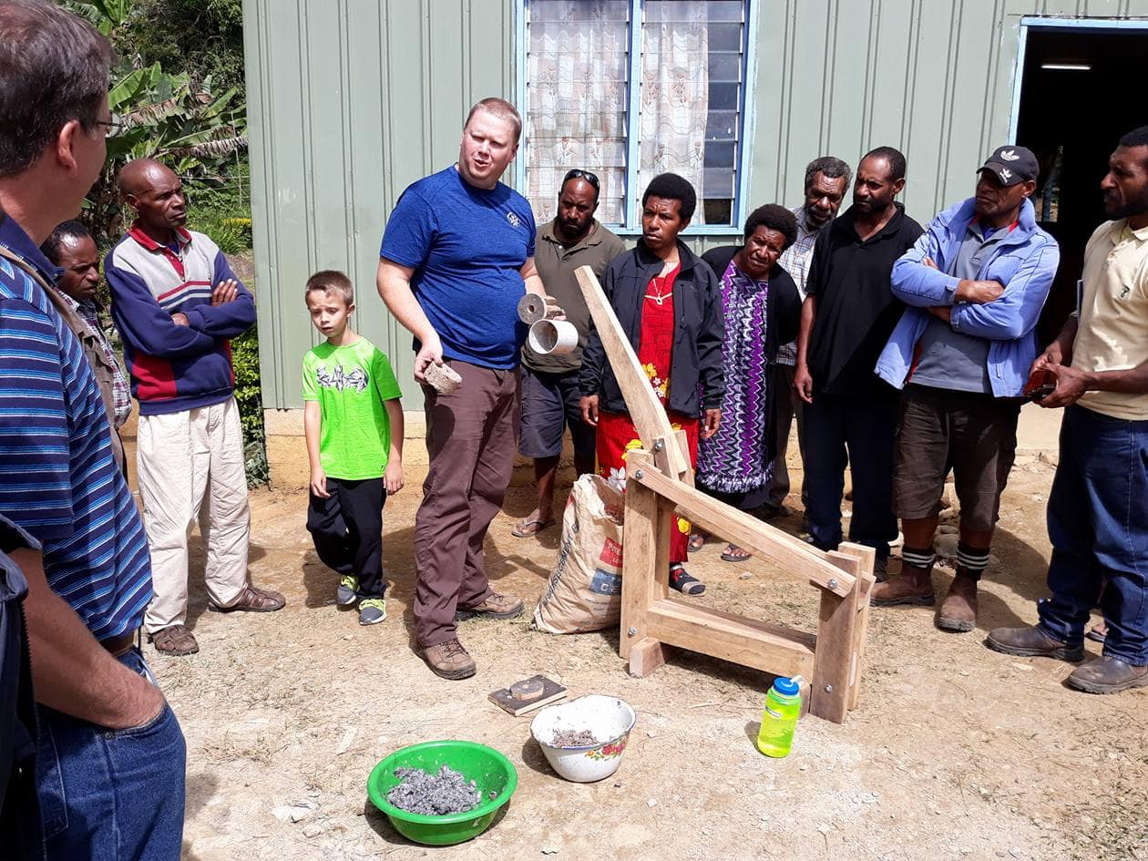 Teaching How to Use a Briquette Press