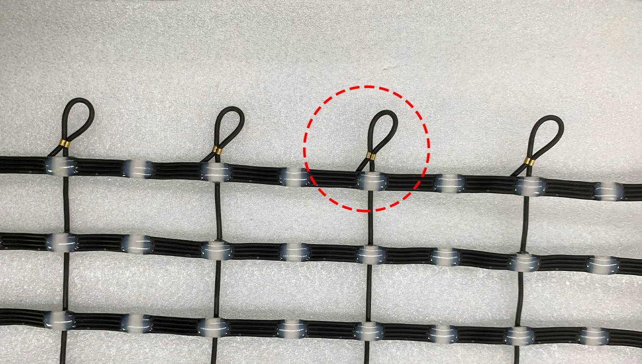 Safety steel cable loop and connection detail on flying LED screen