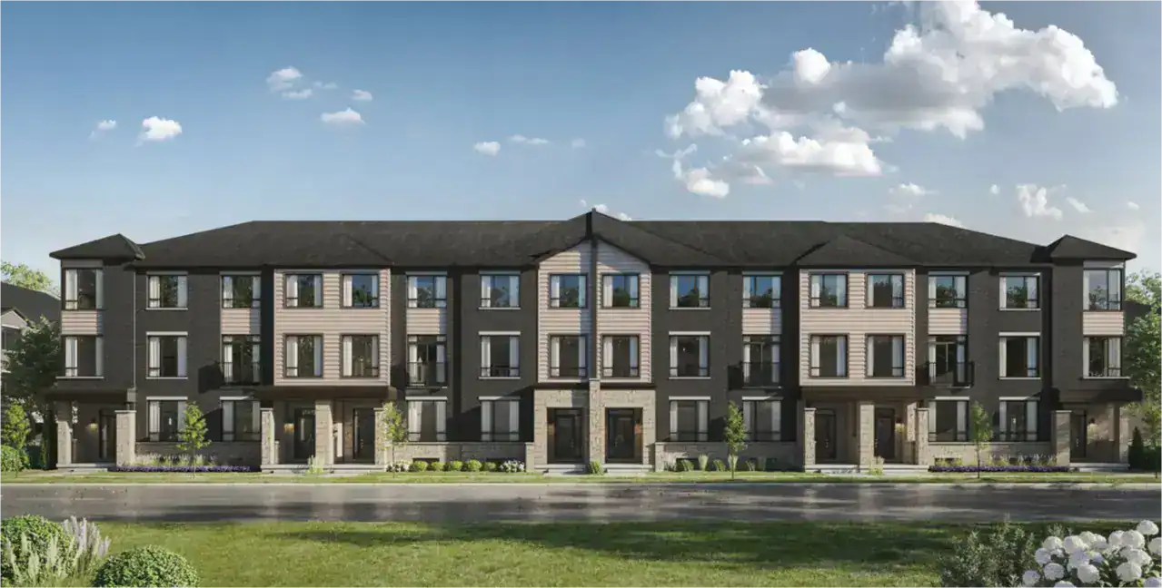 Exterior rendering of modern Lane Towns at Reva Westfield in Brampton, featuring dark brick facades, light siding accents, and multi-level windows under a clear blue sky.