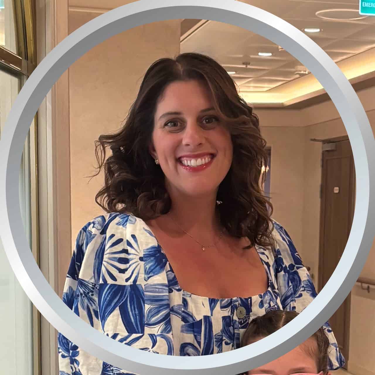 Friendly woman smiling at a vacation resort, happy travel experience with 407 Vacation Co.