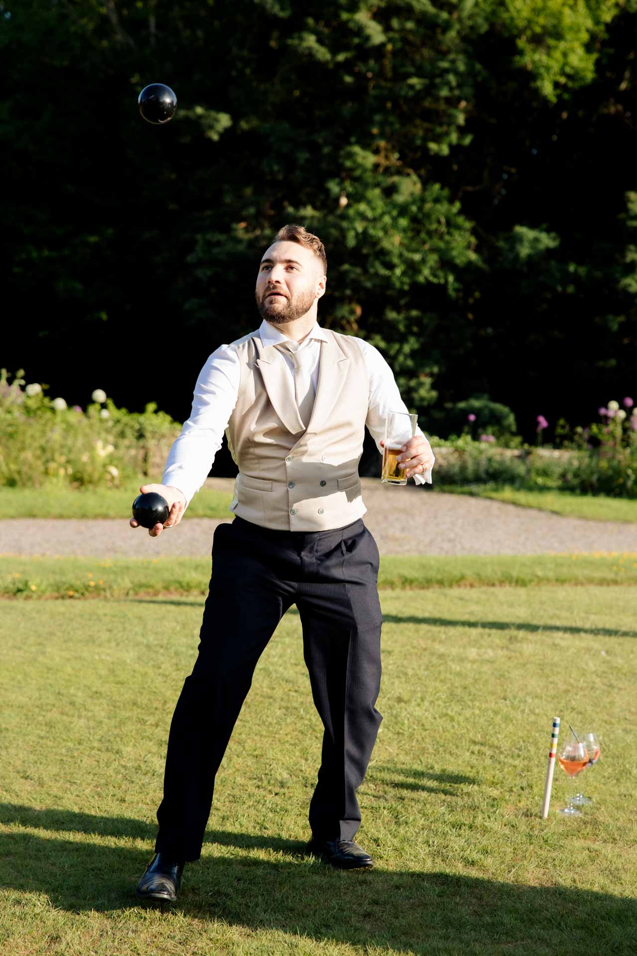 garden games on the lawn at eaves hall during a wedding