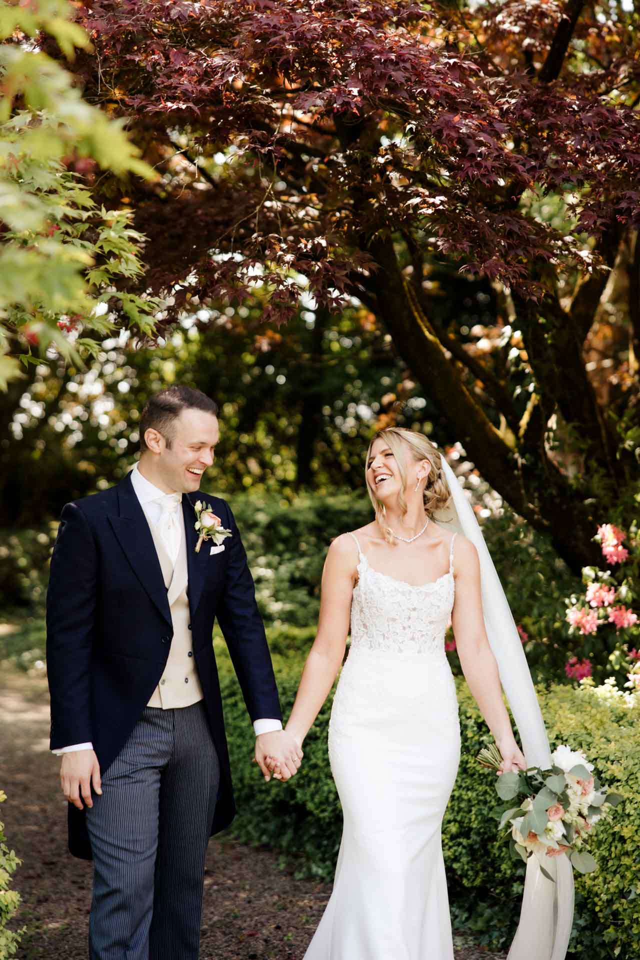 eaves hall wedding photography bride and groom in the gardens