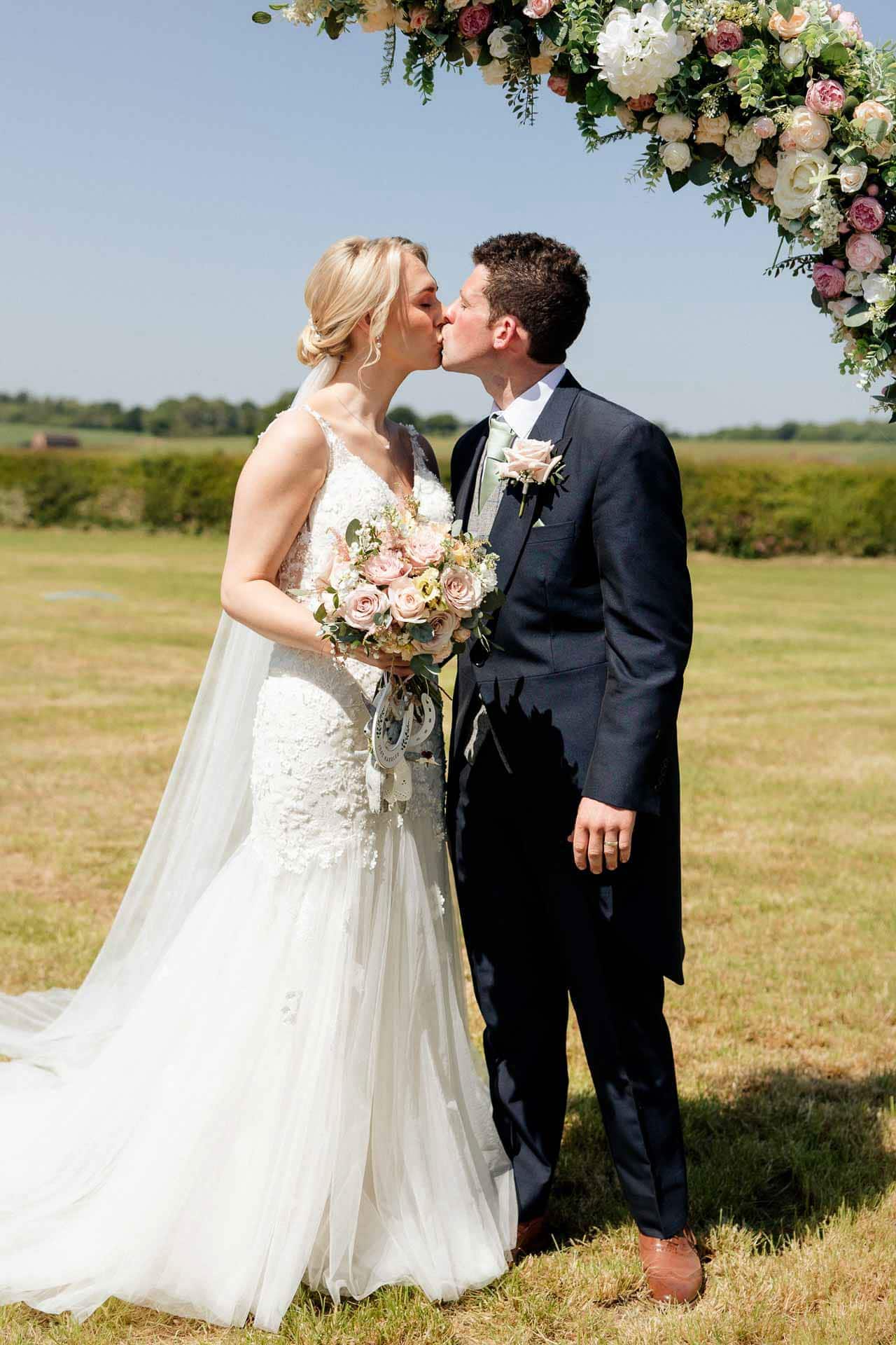 Farm wedding photography for megan and philip on their family farm in August.
