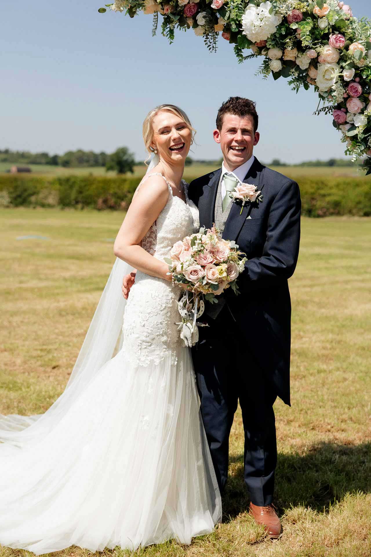 Farm wedding photography for megan and philip on their family farm in August.