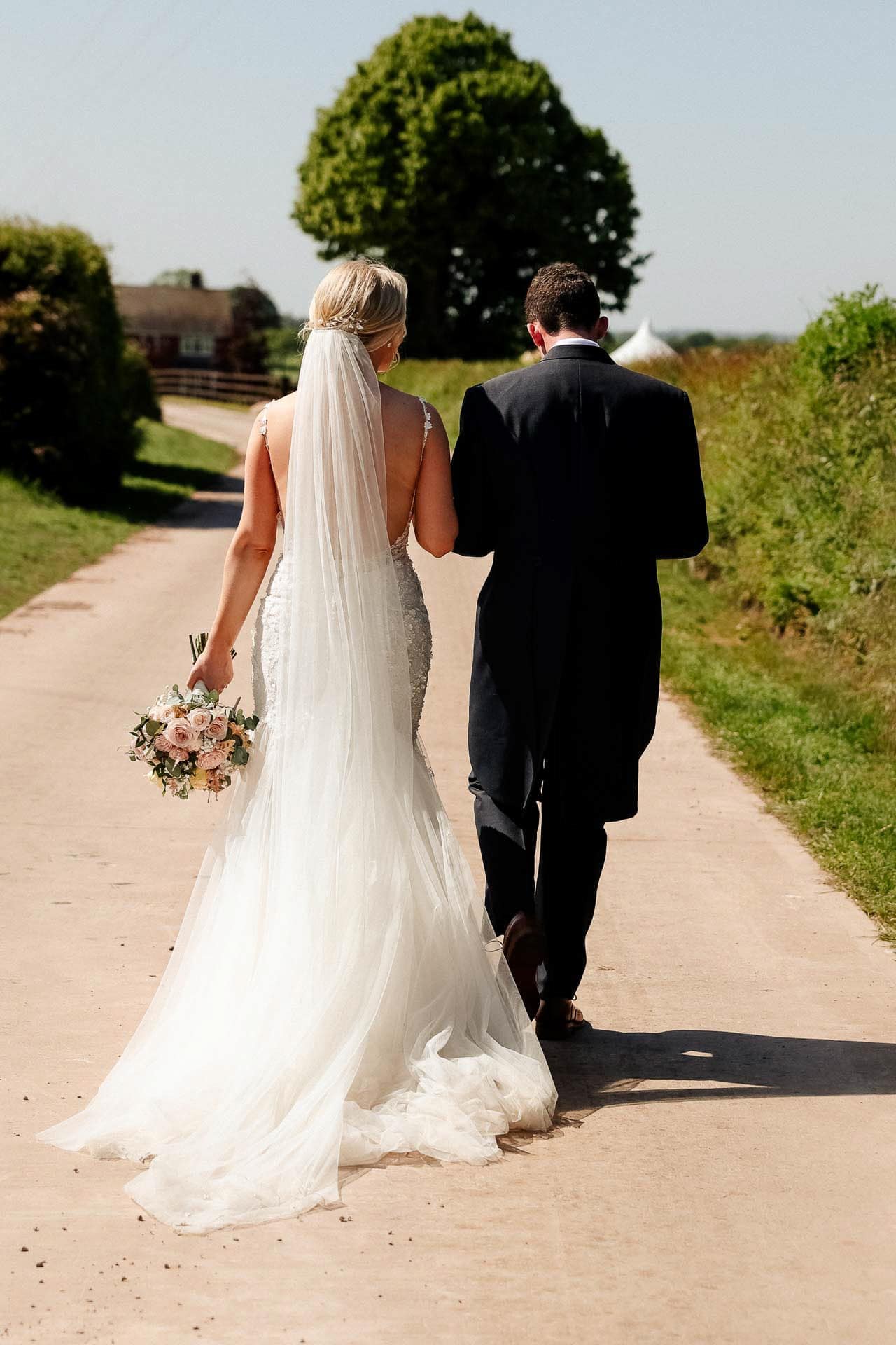 Farm wedding photography for megan and philip on their family farm in August.