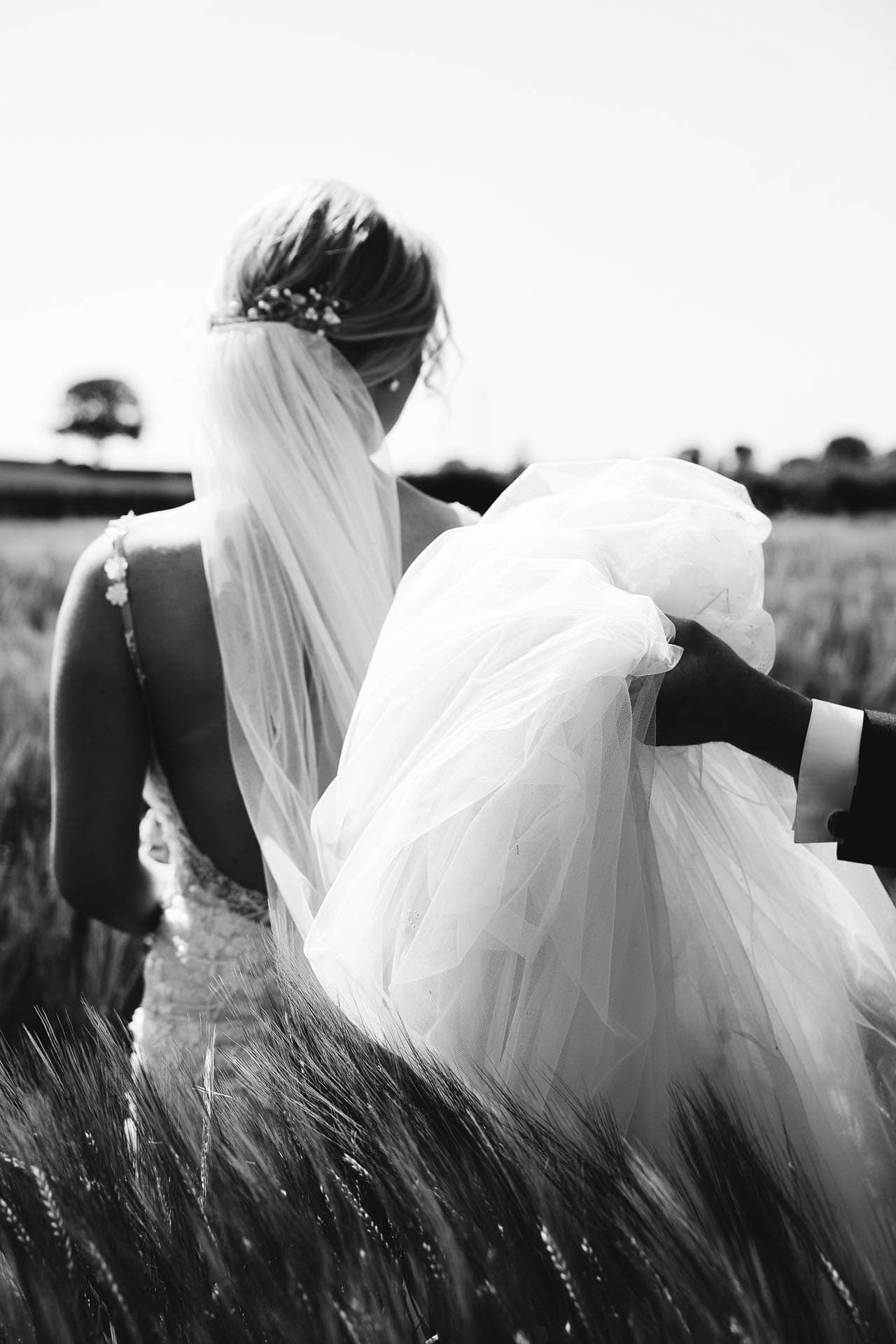 Farm wedding photography for megan and philip on their family farm in August.