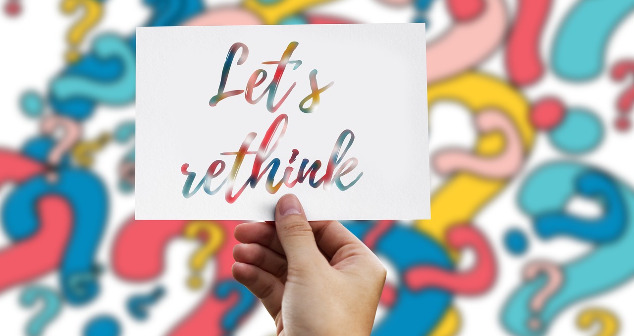 A hand holding a sign AI-generated content may be incorrect.