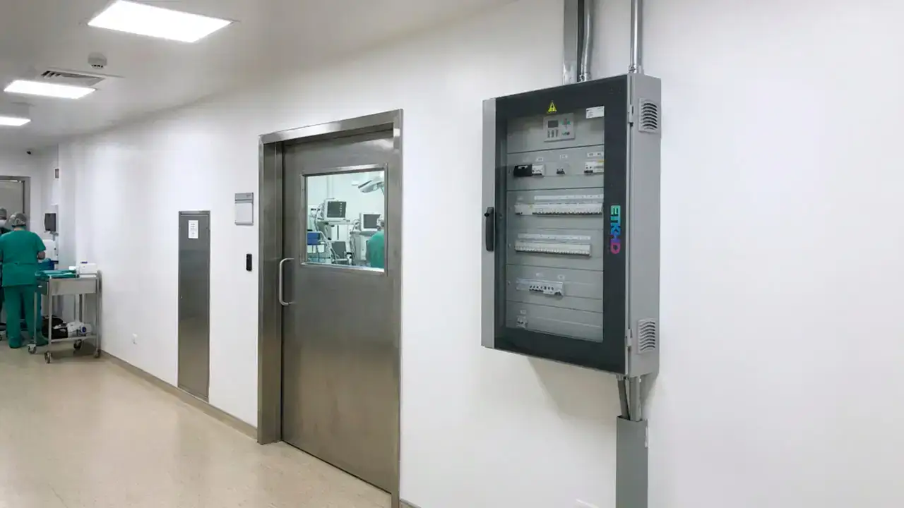Hospital electrical panel with protection devices and control systems