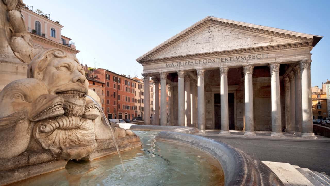 Majestic Roman temple and fountain in Rome, Italy, showcasing historic architecture and popular tourist sights.