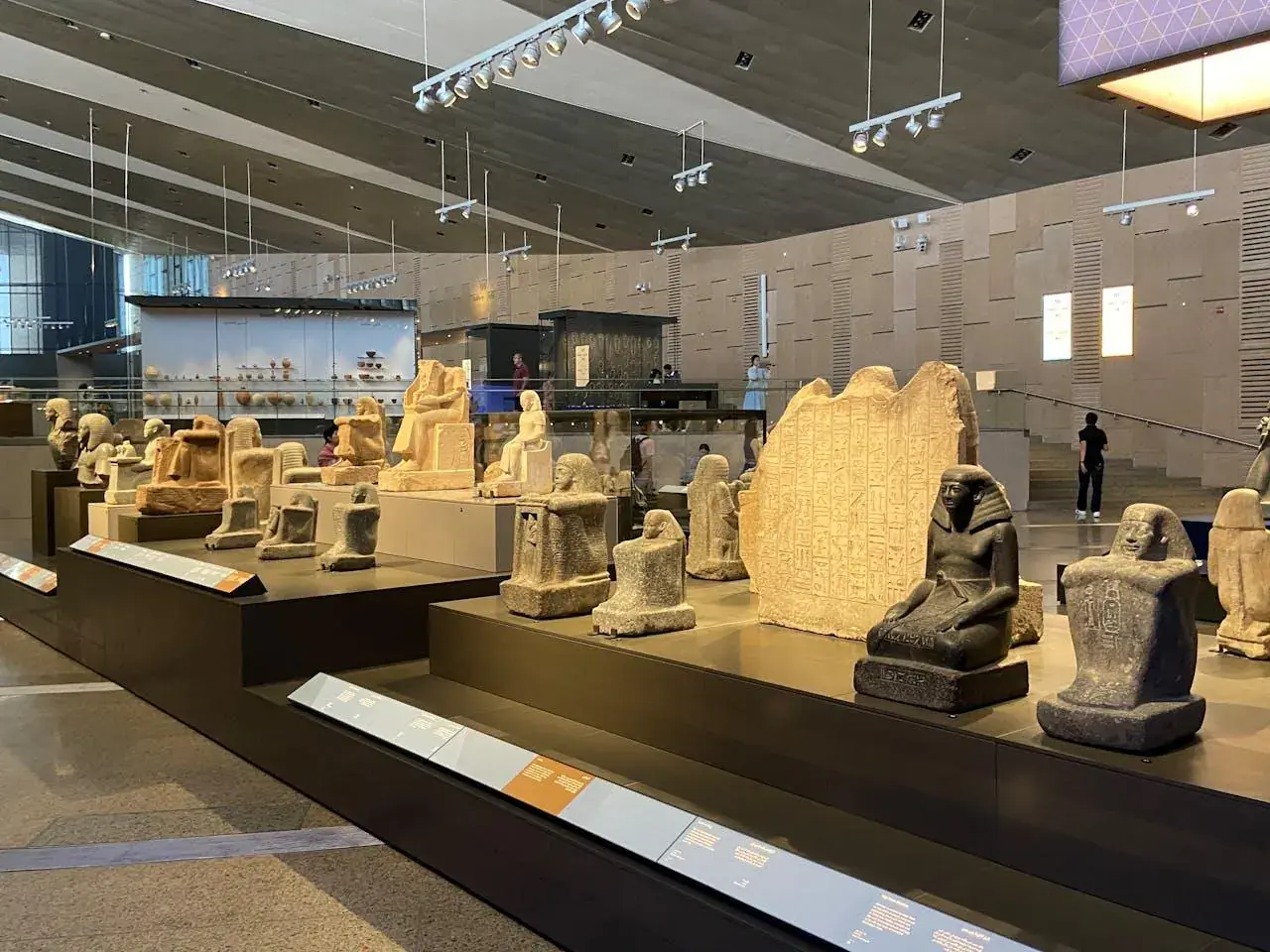 Ancient Egyptian artifacts displayed in a main museum gallery