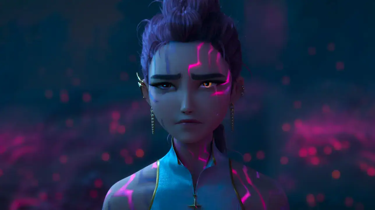 In the light, Rumi's demon marks are visible glowing on her skin.