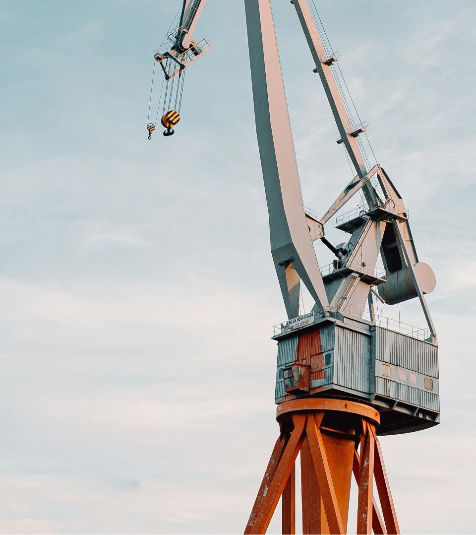 Industrial crane structure at a construction site, showcasing engineering and architectural design.