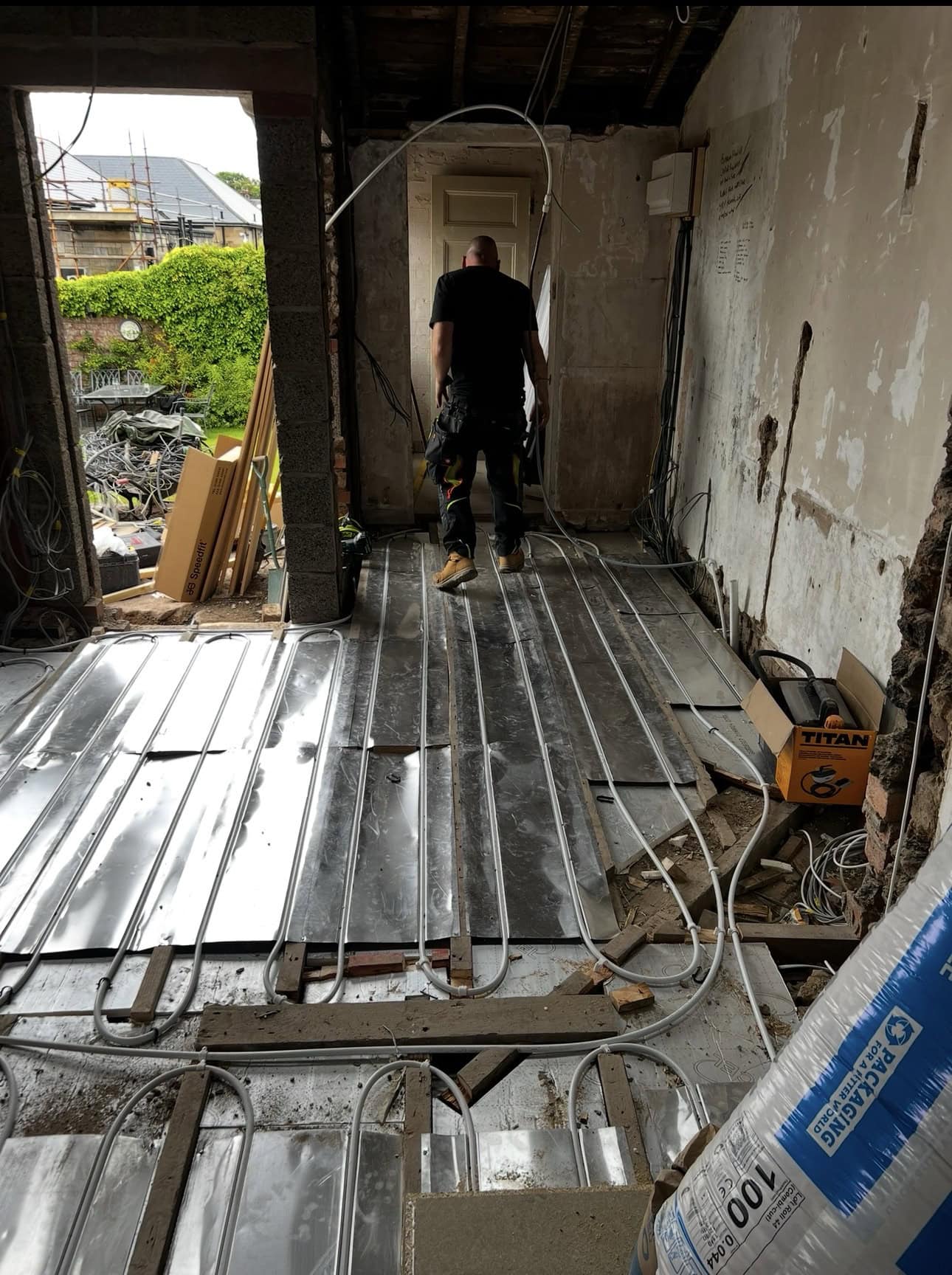underfloor heating being installed in glasgow, project progressing with underfloor heating and spreader plates.