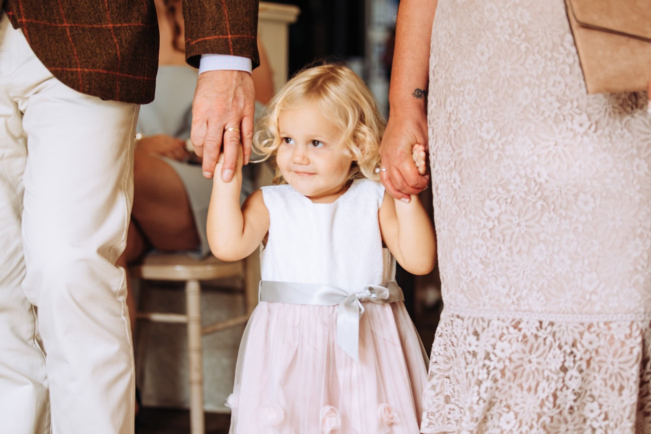 brides daughter walking down asile