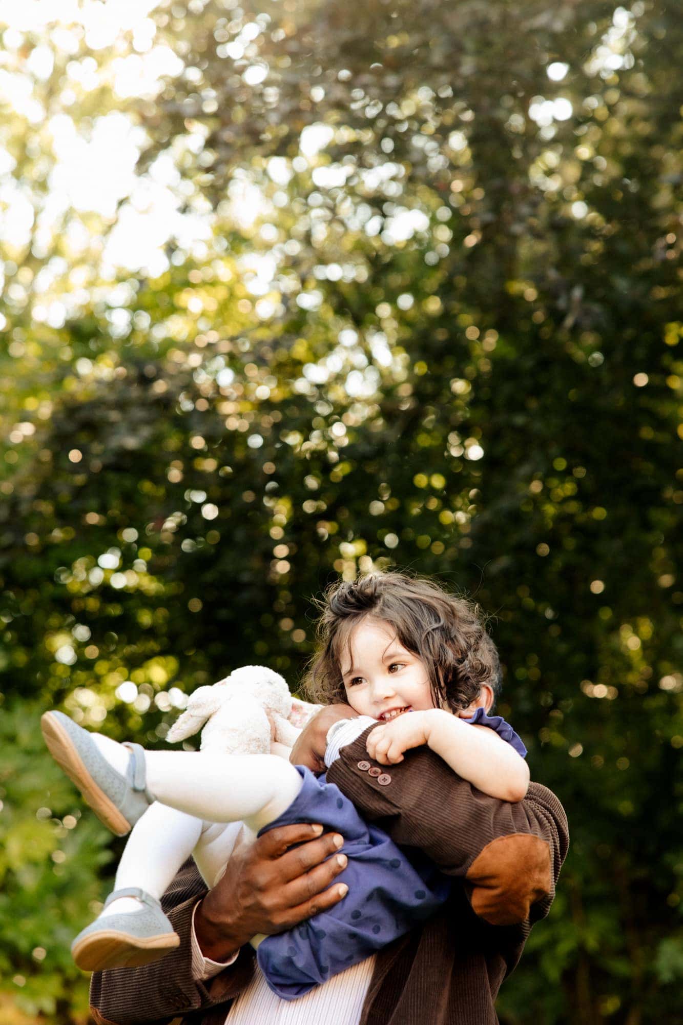 Family photography session in bowden in the back garden of a family home