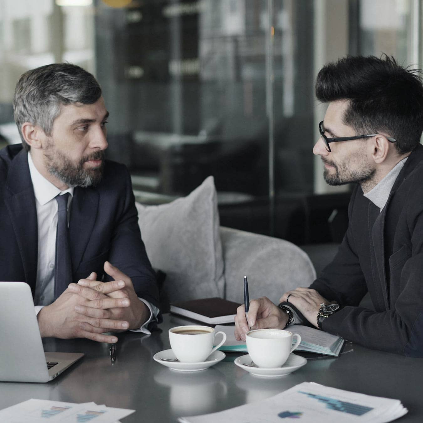 B2B client strategy meeting discussing integrated marketing and business growth
