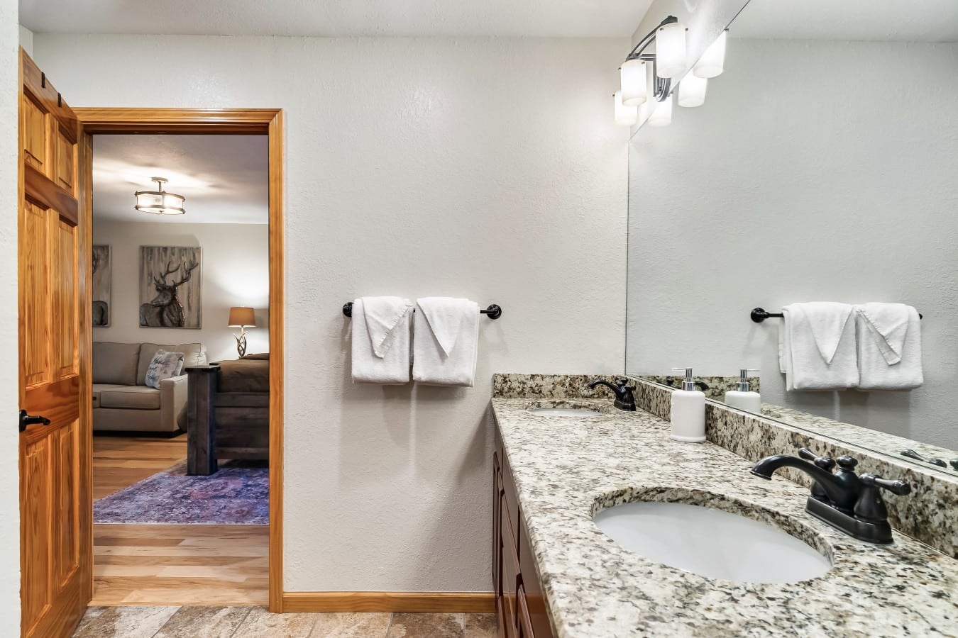 The en suite bathroom has a dual vanity for added convenience.