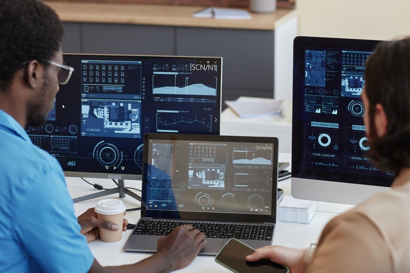 Focus On Laptop With Statistic Graphic Data On Screen And It Manager - Auster Inteligência Contábil