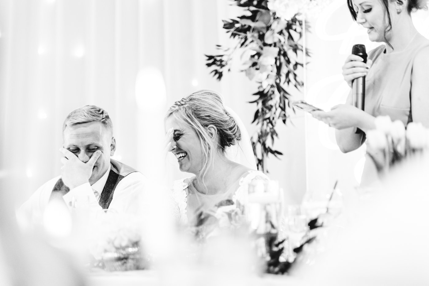 candid wedding photography taken during the speeches and outside in the grounds of heaton house farm in cheshire