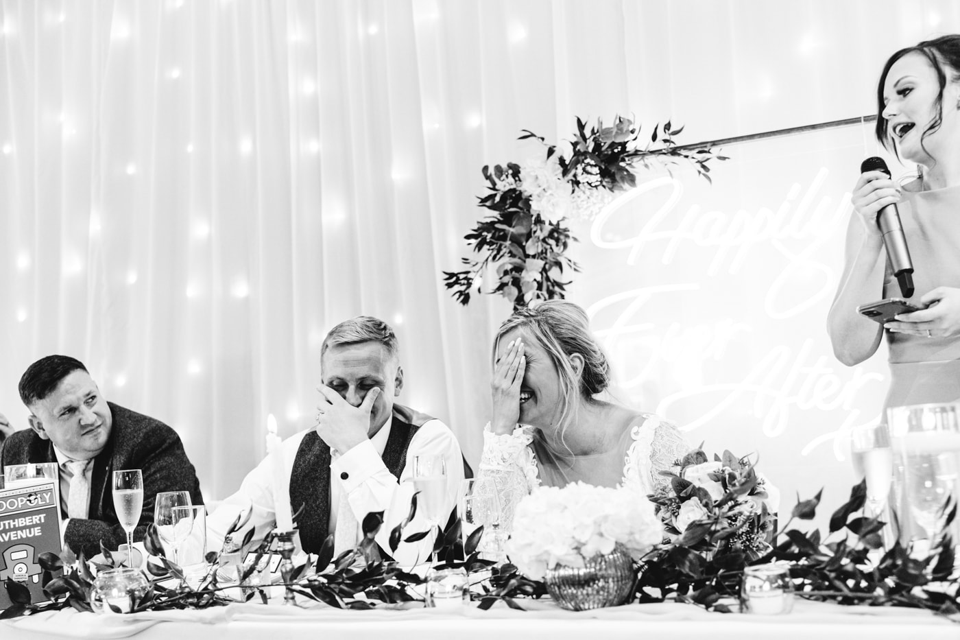 candid wedding photography taken during the speeches and outside in the grounds of heaton house farm in cheshire