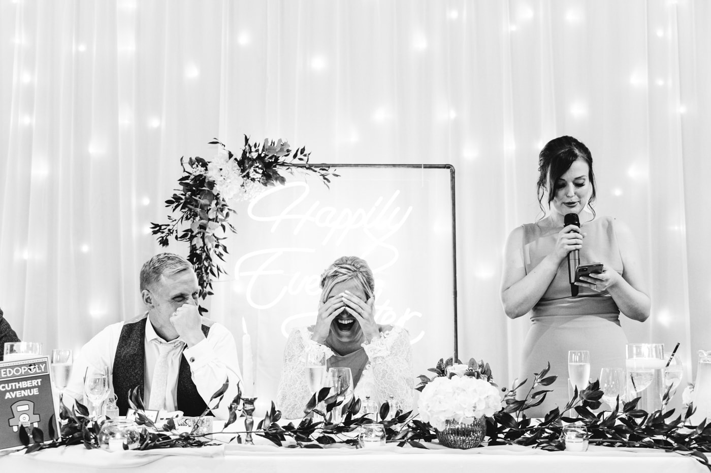 candid wedding photography taken during the speeches and outside in the grounds of heaton house farm in cheshire