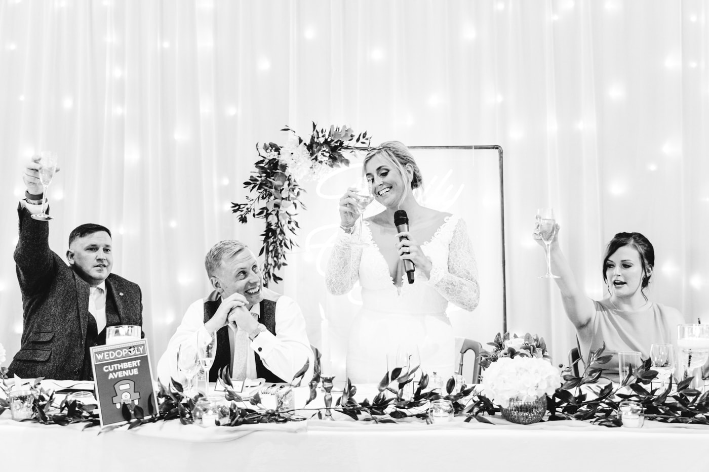candid wedding photography taken during the speeches and outside in the grounds of heaton house farm in cheshire