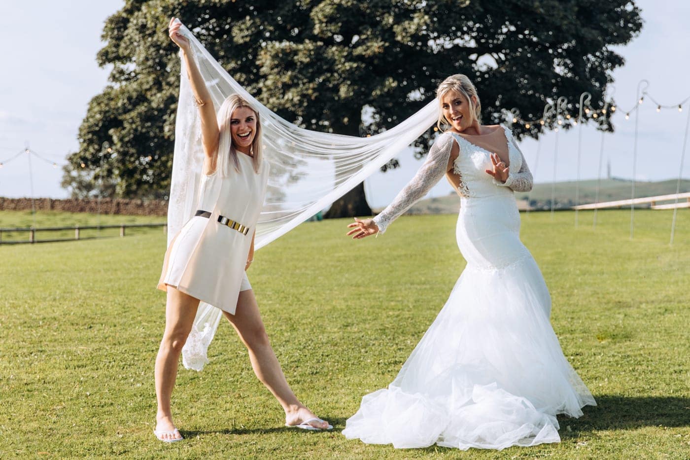 candid wedding photography taken during the speeches and outside in the grounds of heaton house farm in cheshire
