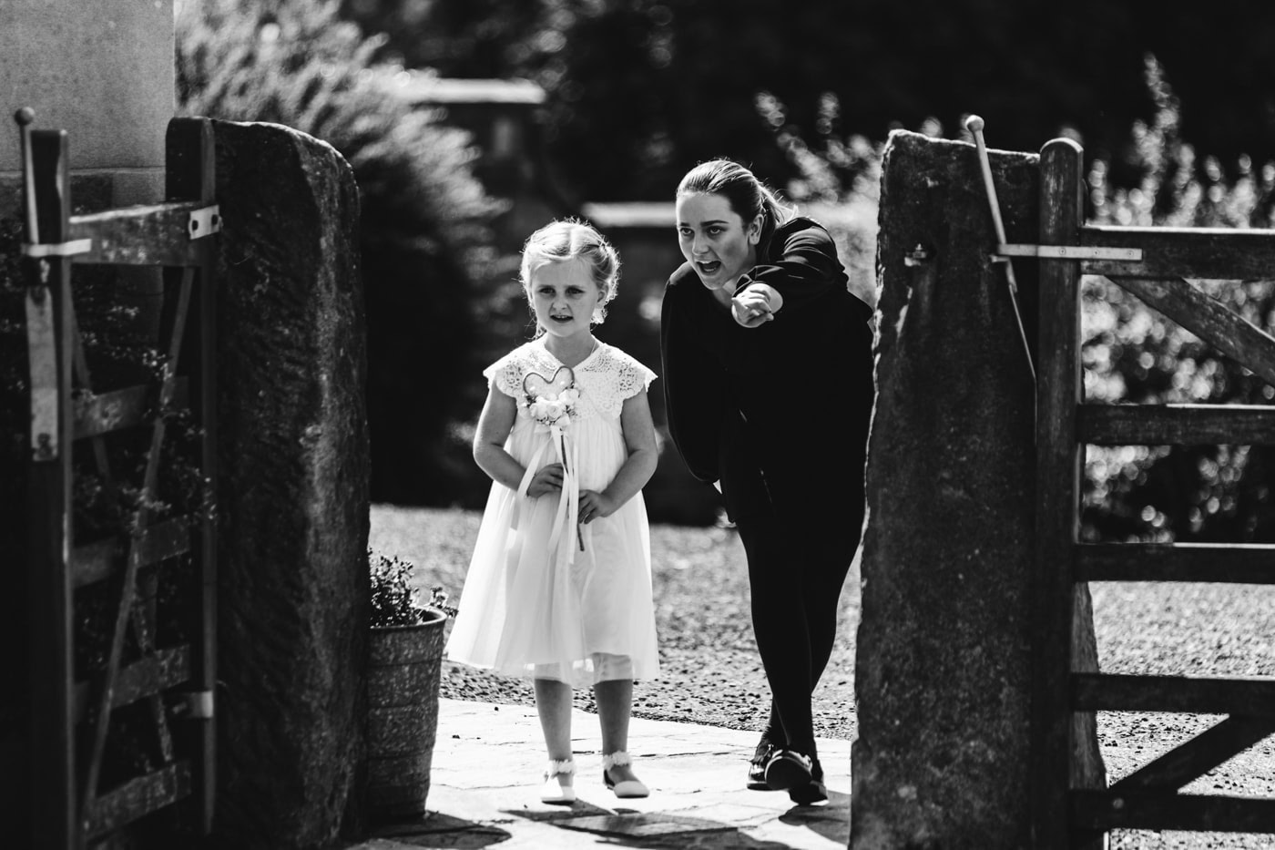 an outdoor ceremony with the bride walking down the aisle to get married at heaton house farm