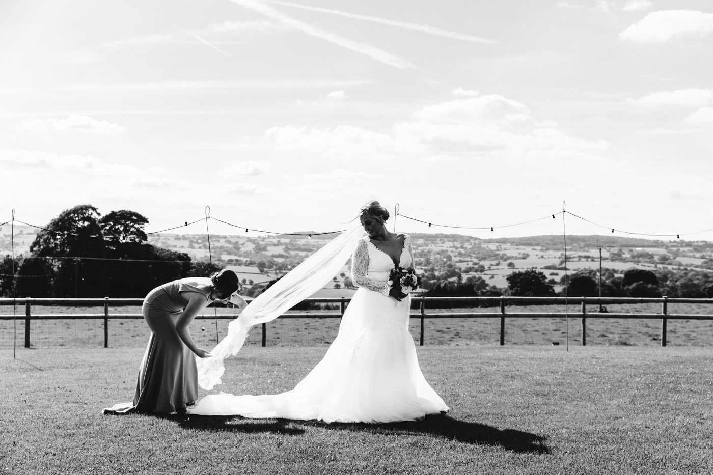 candid wedding photography taken during the speeches and outside in the grounds of heaton house farm in cheshire