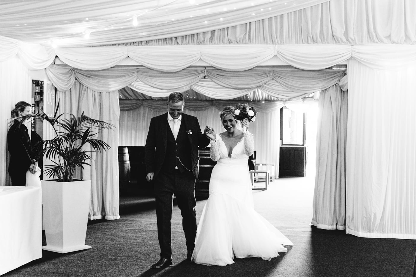 candid wedding photography taken during the speeches and outside in the grounds of heaton house farm in cheshire