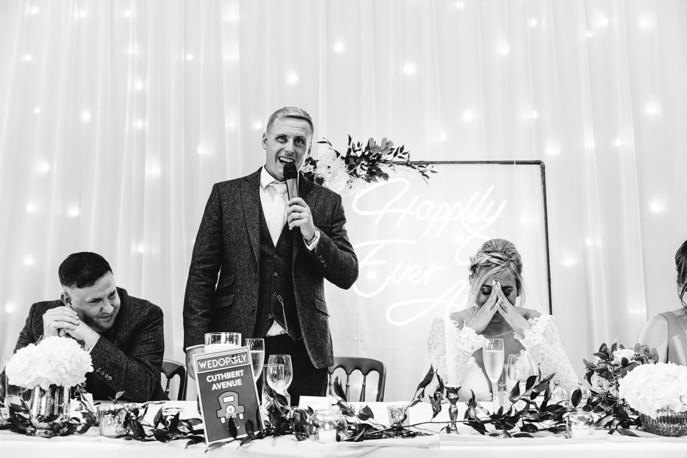 candid wedding photography taken during the speeches and outside in the grounds of heaton house farm in cheshire