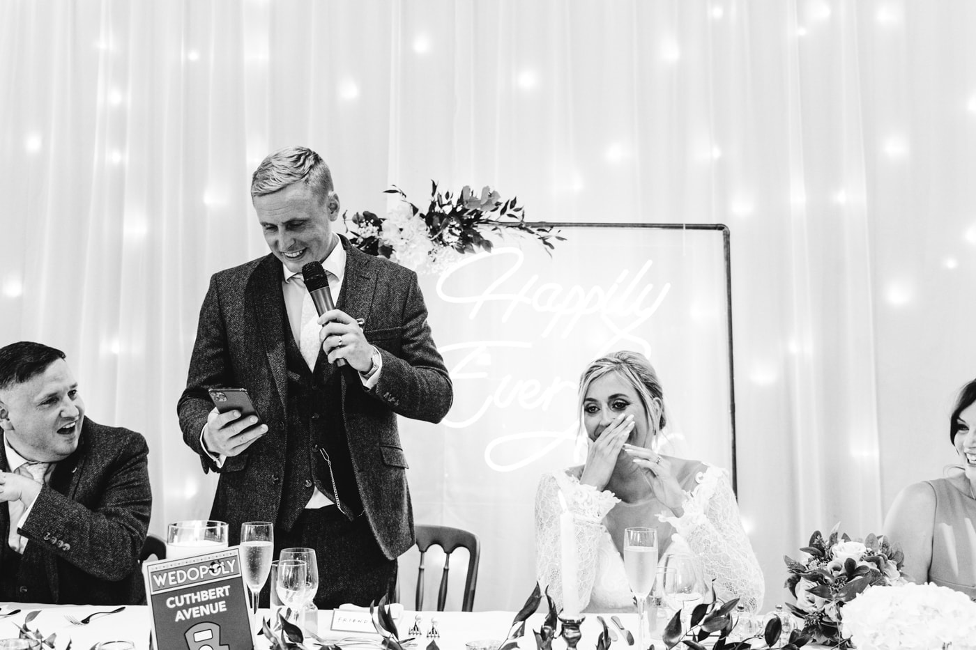candid wedding photography taken during the speeches and outside in the grounds of heaton house farm in cheshire