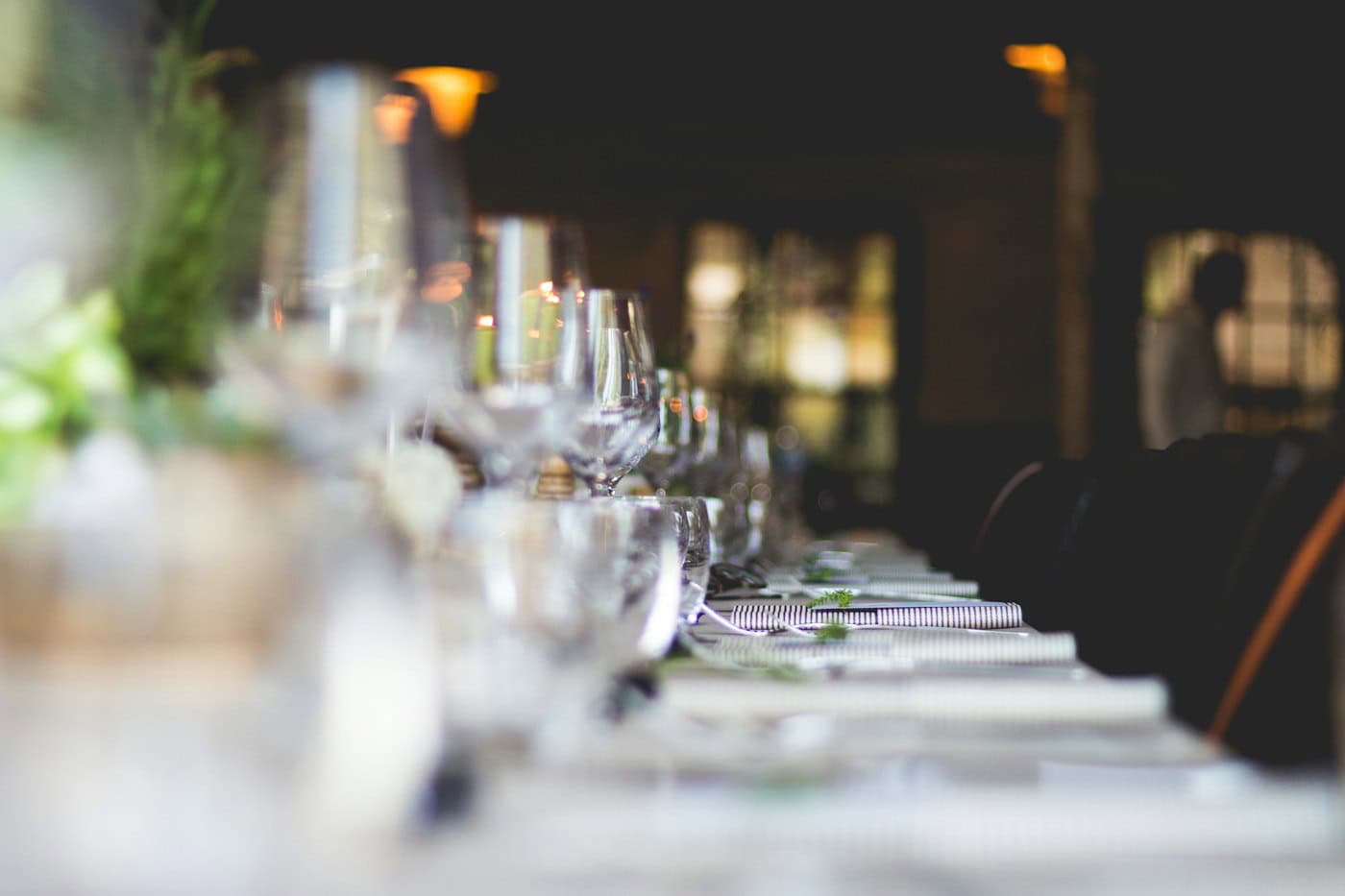 Best Way to Get Featured in Food & Wine en Español (2026): Guaranteed Features for Food, Wine and Travel Brands 3 Long dining table set with wine glasses for a Food & Wine en Español feature