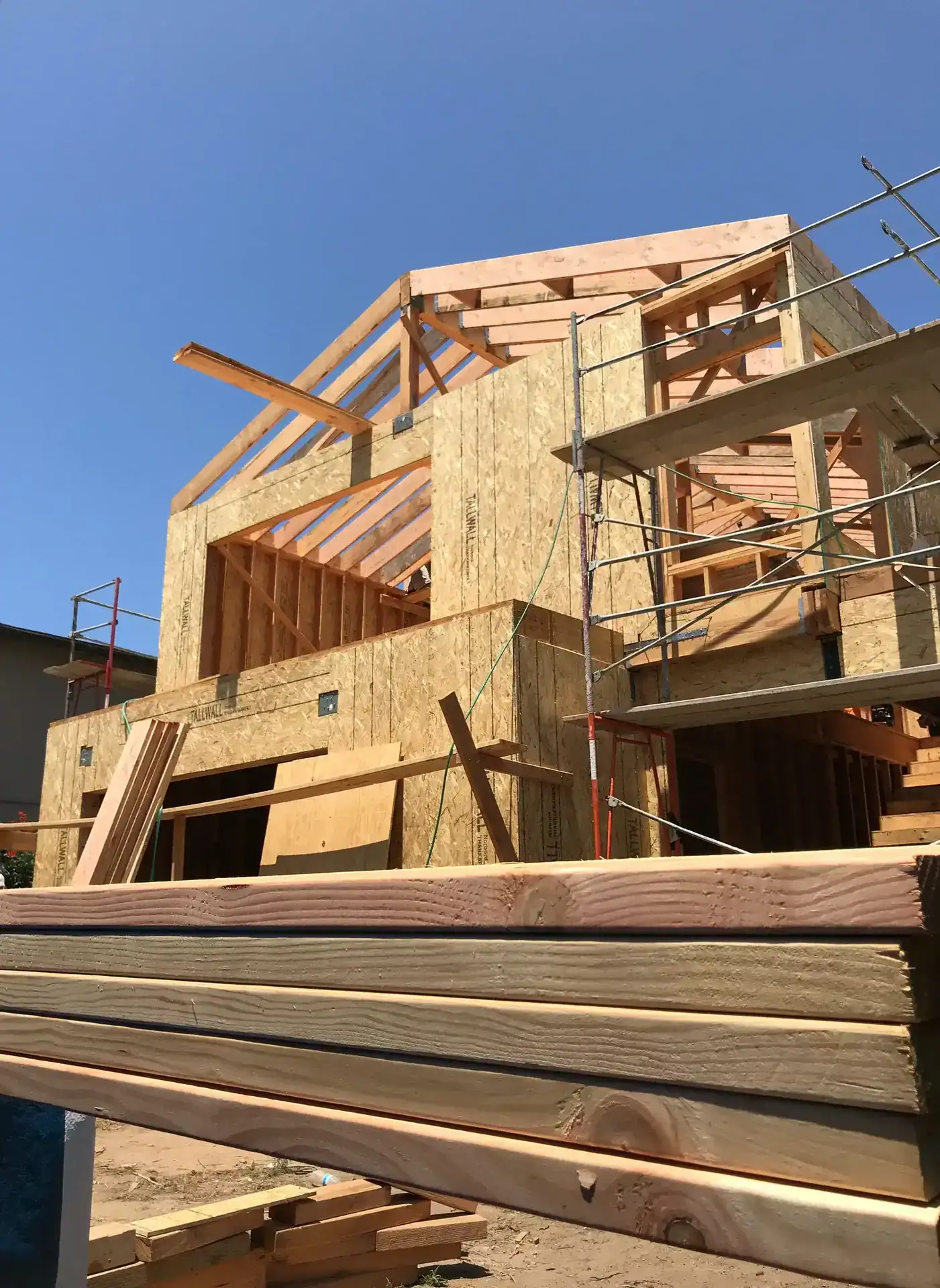 Framework for a hillside modern residence under construction in Los Angeles.