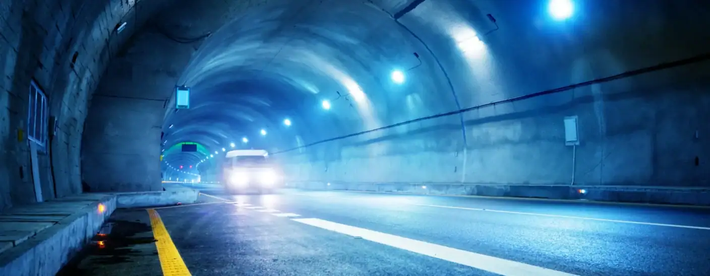 Vehicle driving through the 2nd Coentunnel in the Netherlands with advanced surveillance systems in place