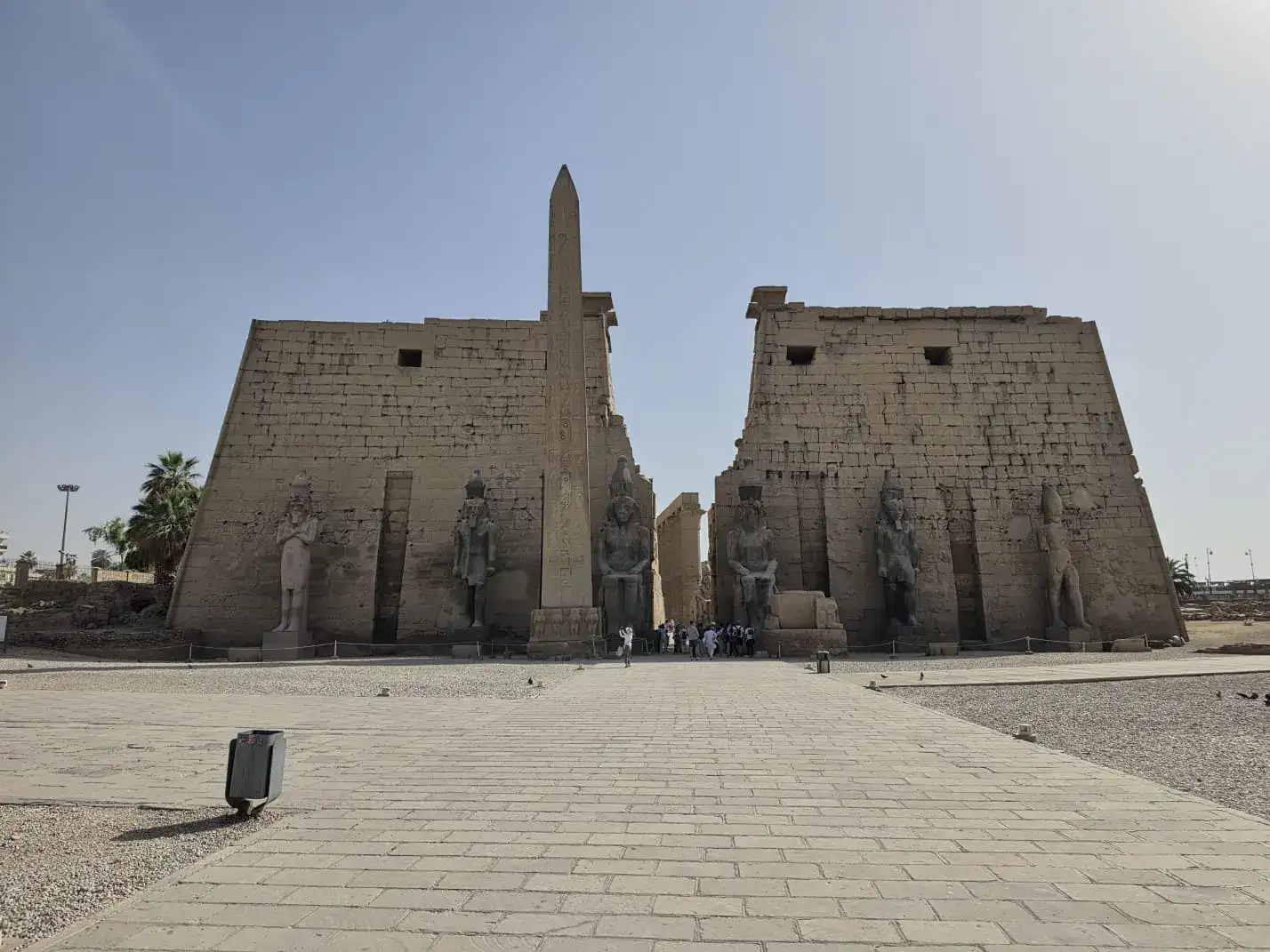 Luxor Temple monumental entrance with an obelisk and royal statues