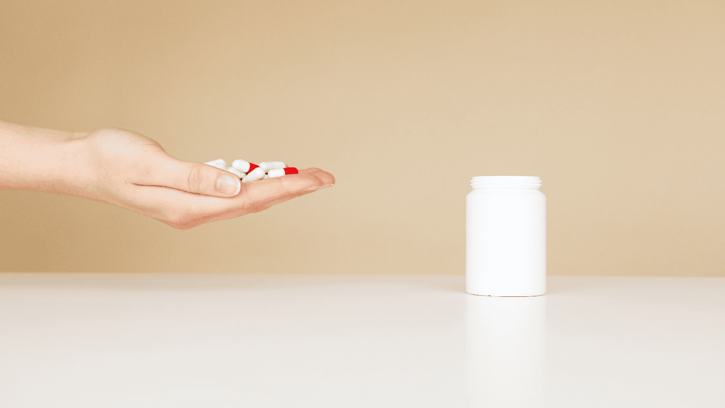 Person holding prescription drugs